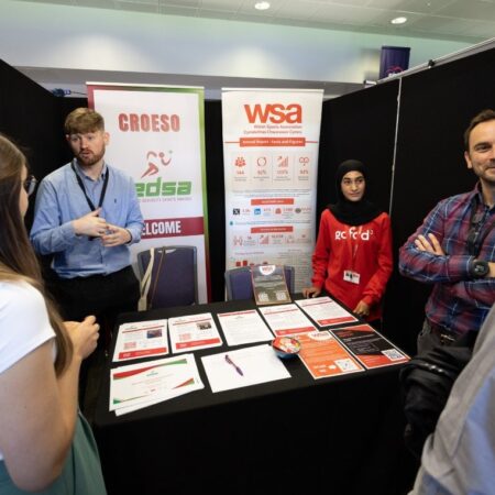 Information table with brochures and banners for community services.